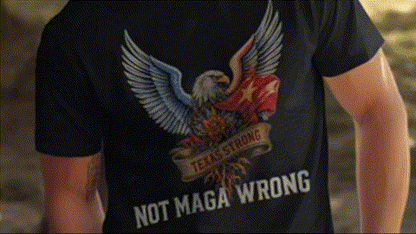 a person wearing a black t-shirt with a graphic design featuring an eagle and the text "Texas Strong" and "Not MAGA Wrong".