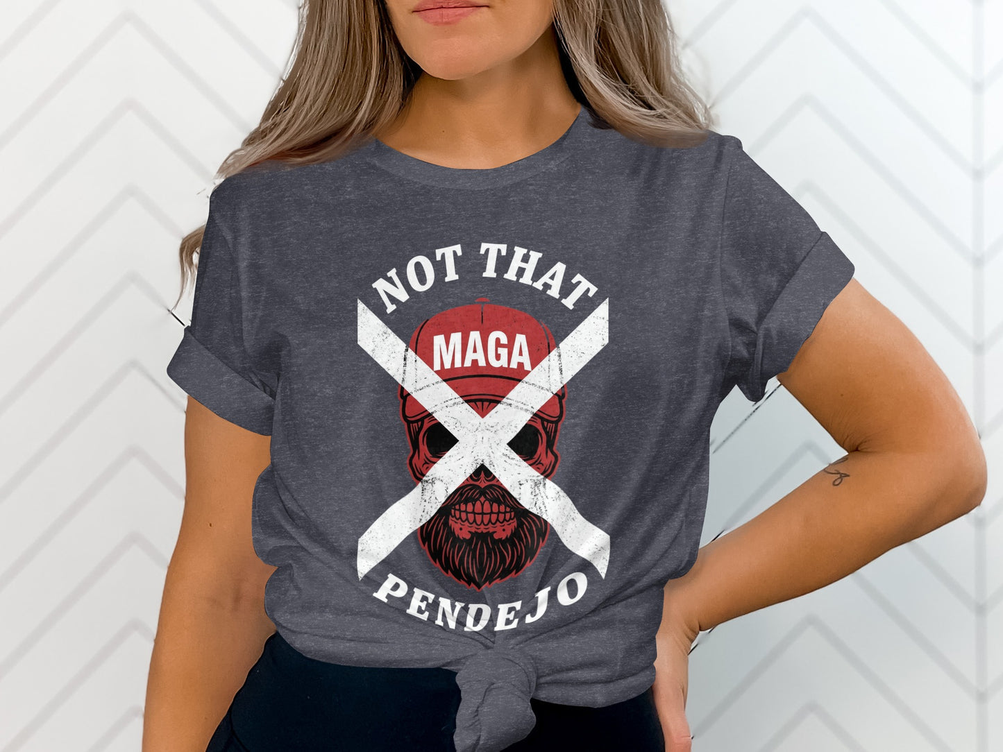 Dark grey t-shirt with a white skull and text: NOT MAGA PENDEJO.