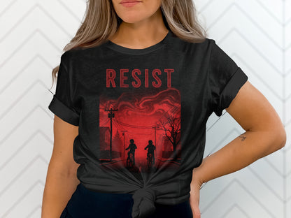 Black t-shirt with red "RESIST" text and silhouetted figures on bicycles.