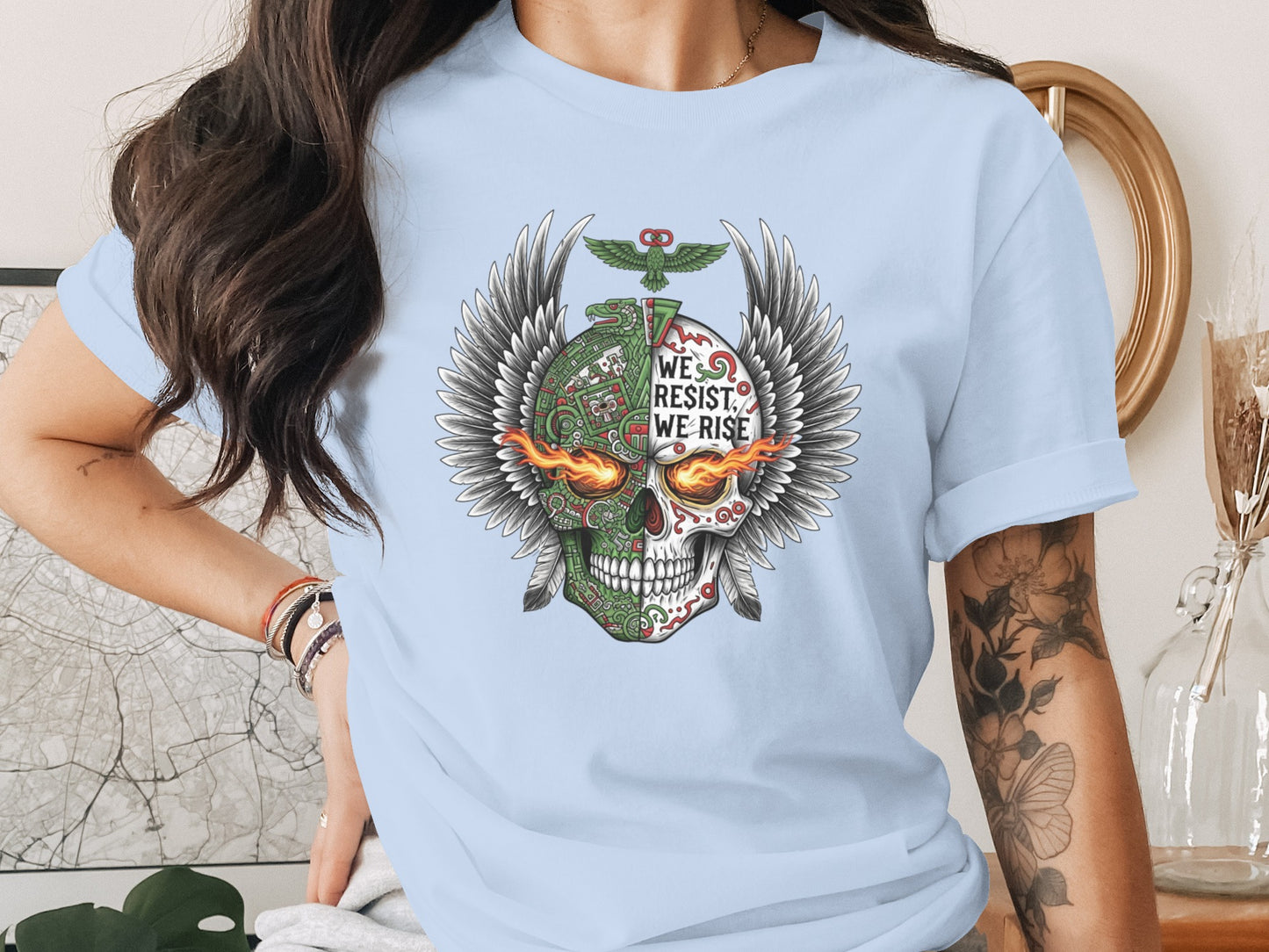 We Resist We Rise Winged Skull Graphic Tee product type