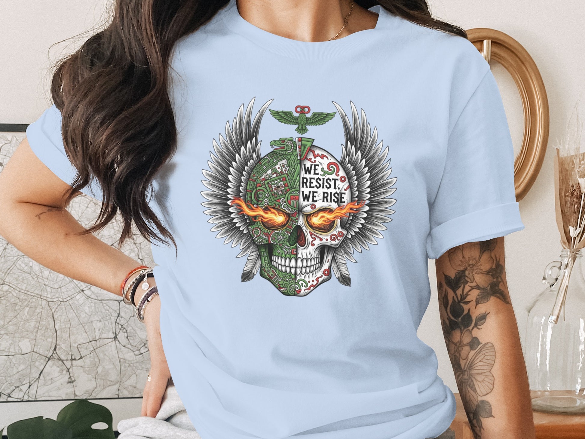 We Resist We Rise Winged Skull Graphic Tee product type