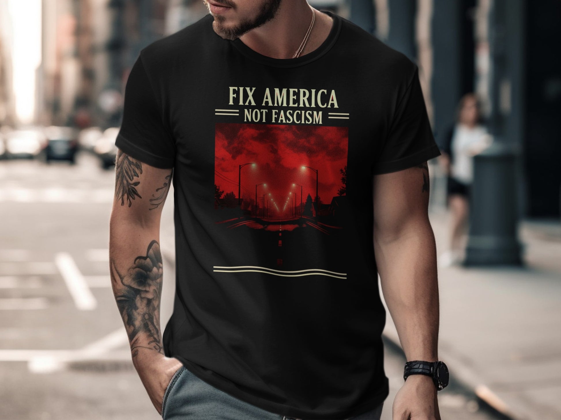 Black t-shirt with "FIX AMERICA NOT FASCISM" and streetlights graphic.