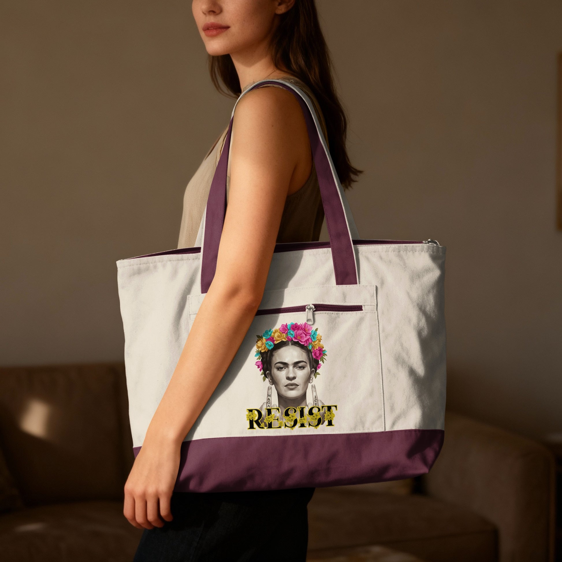 Tote bag with Frida Kahlo graphic and "RESIST" text.