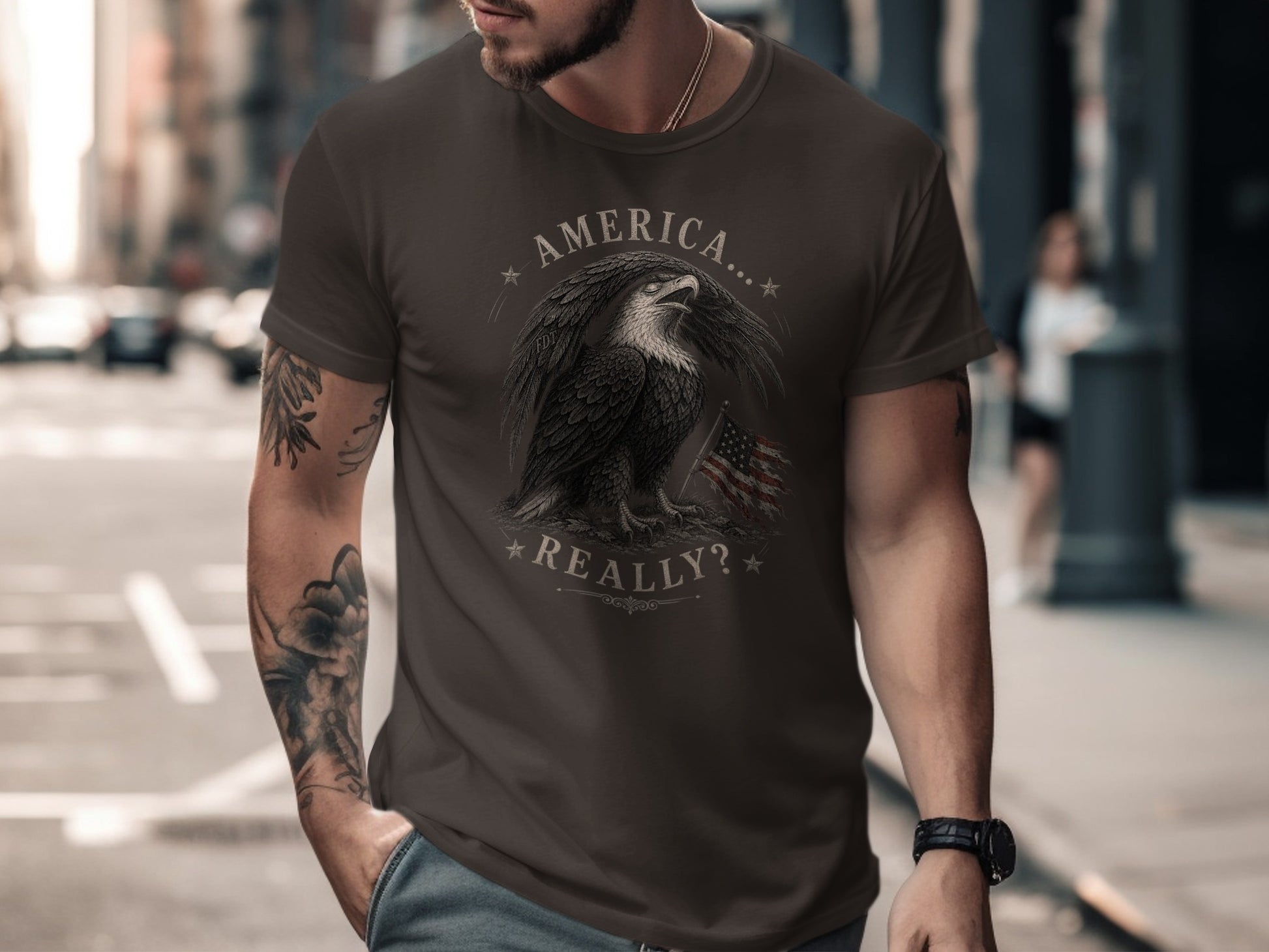 Dark brown t-shirt with eagle and American flag graphic and "America...Really?" text.