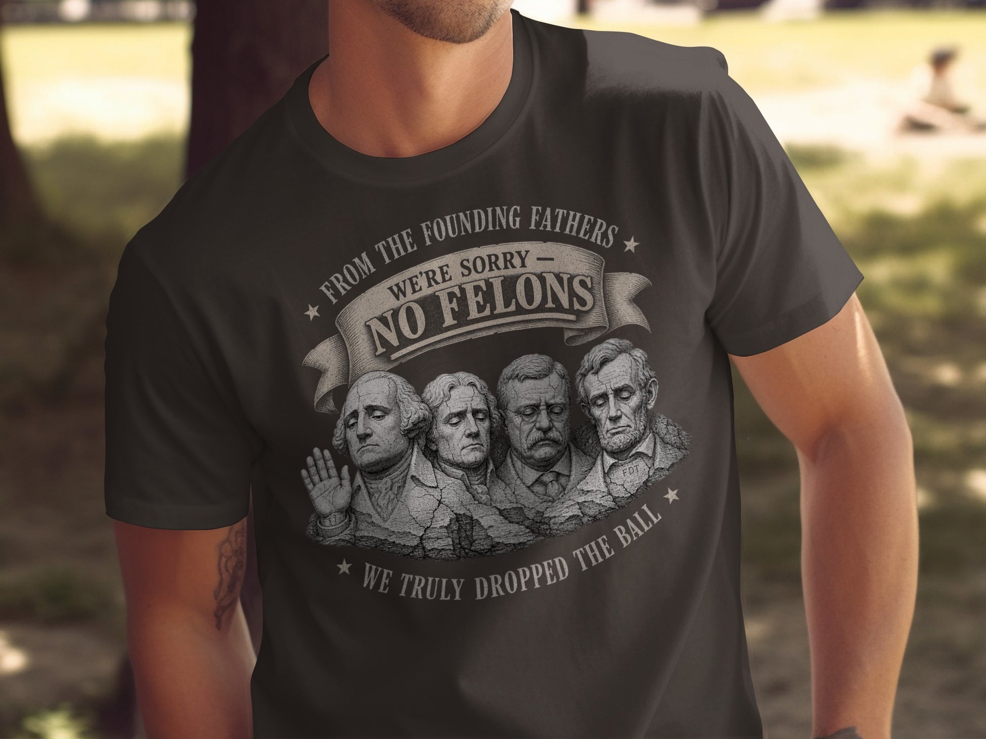 Founding Fathers graphic tee: "NO FELONS", "WE TRULY DROPPED THE BALL".