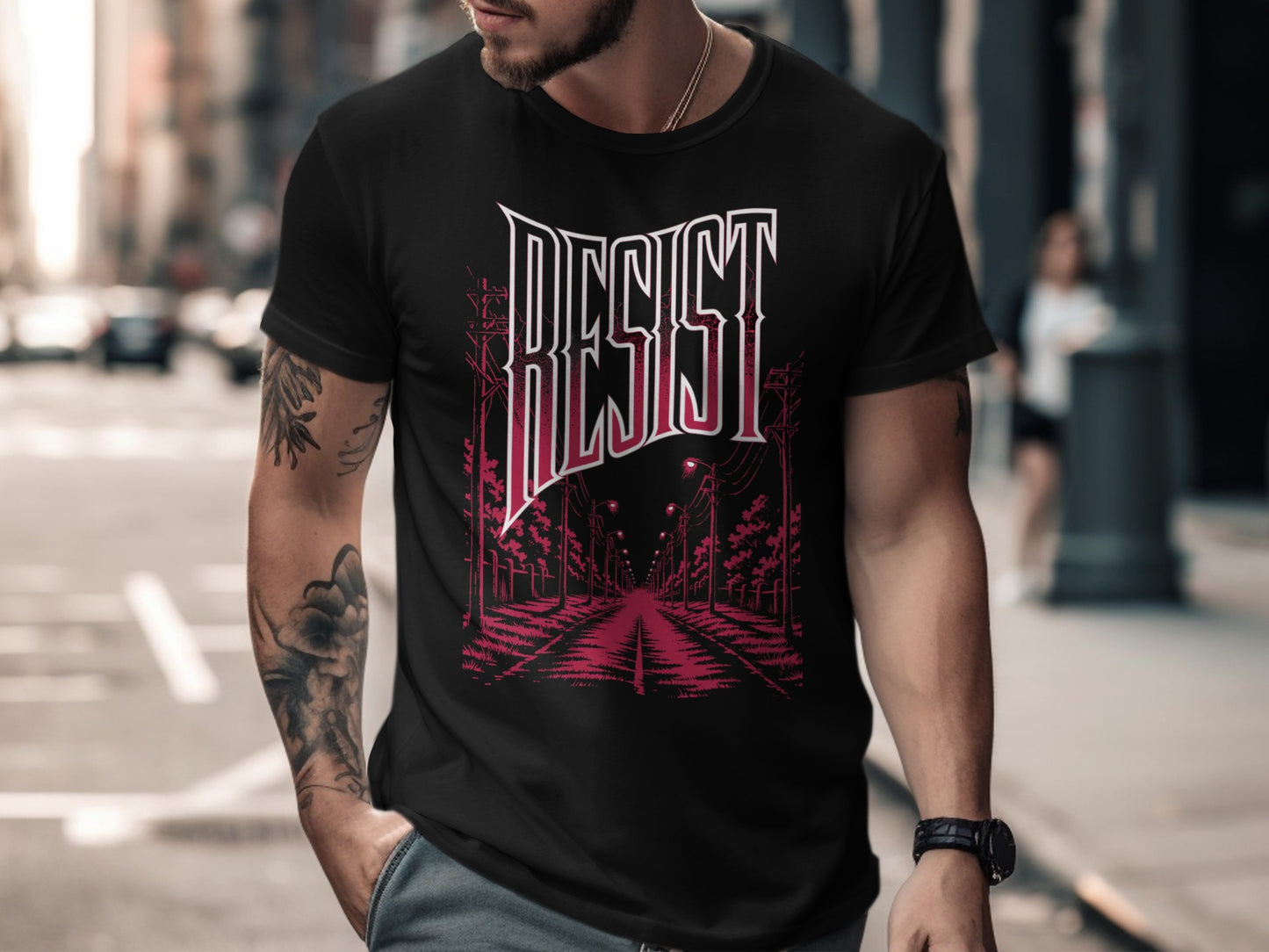 Black t-shirt with "RESIST" in stylized red font and a street scene.