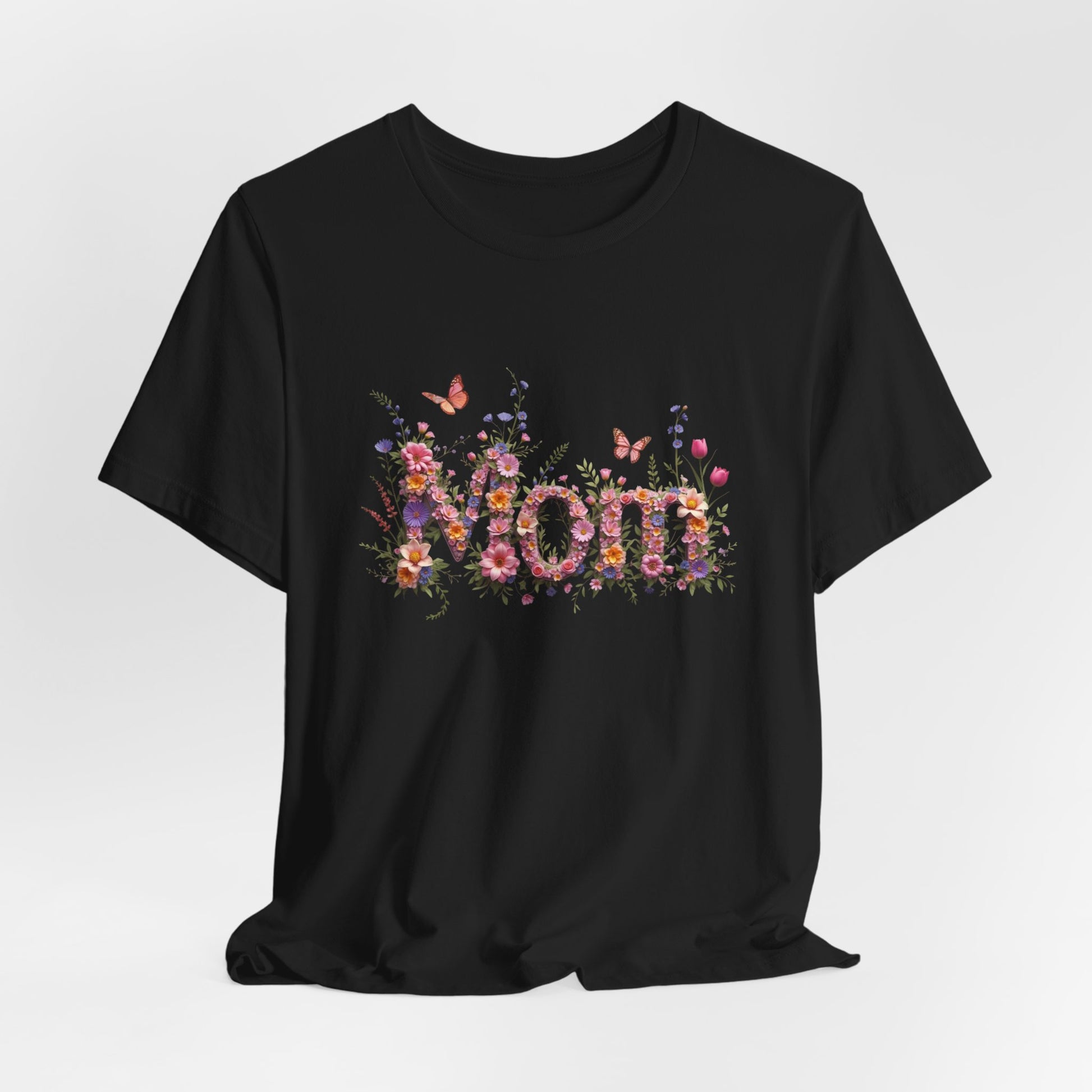 Black t-shirt with "Mom" spelled out in colorful flowers and butterflies.