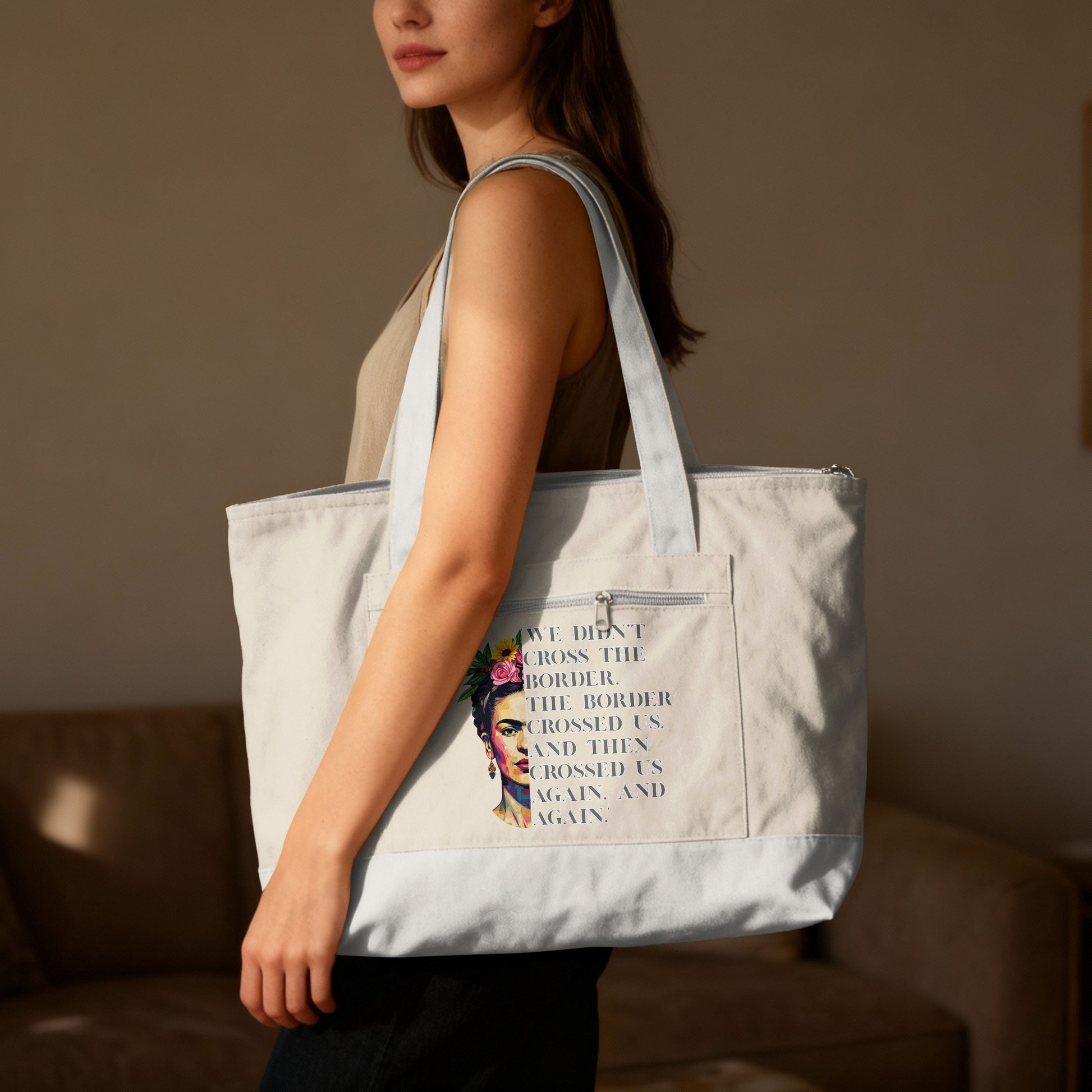 Tote bag with Frida Kahlo graphic and quote "The border crossed us."