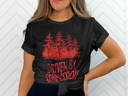 Black t-shirt with red pine trees and "Driven By Compassion" text.
