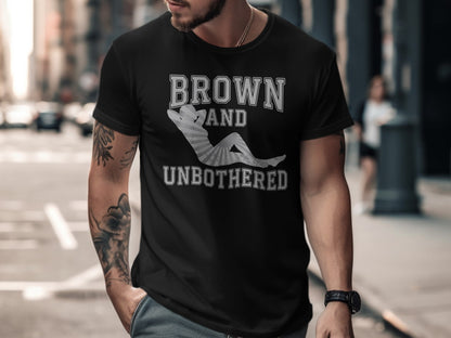 Black t-shirt with "BROWN AND UNBOTHERED" text and a striped silhouetted person.