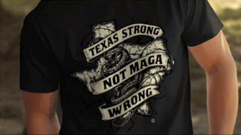 A black t-shirt with a graphic design on the back, featuring the text "Texas Strong Not MAGA Wrong" in a bold, white font.