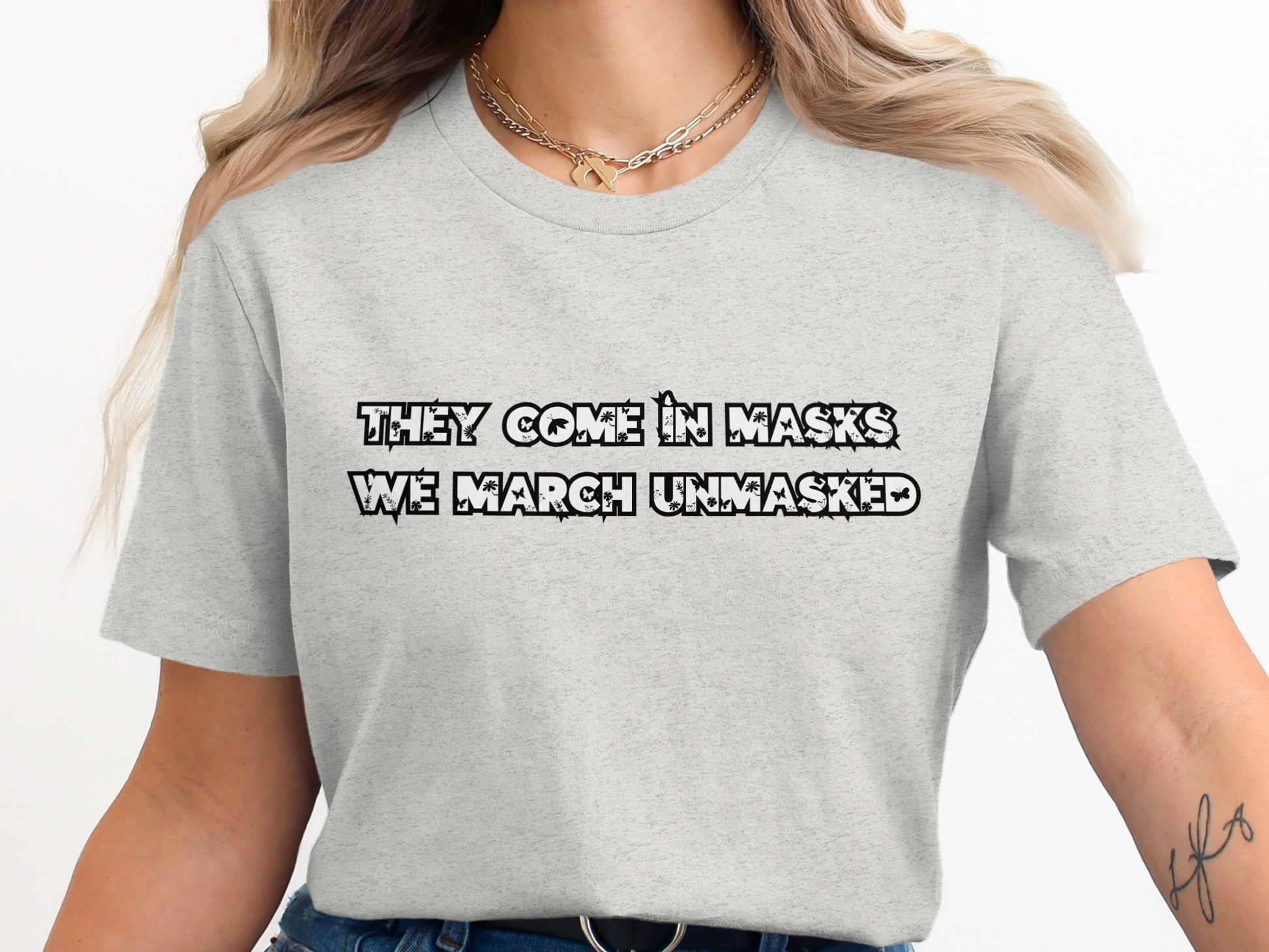 They Come in Masks We March Unmasked T-Shirt product