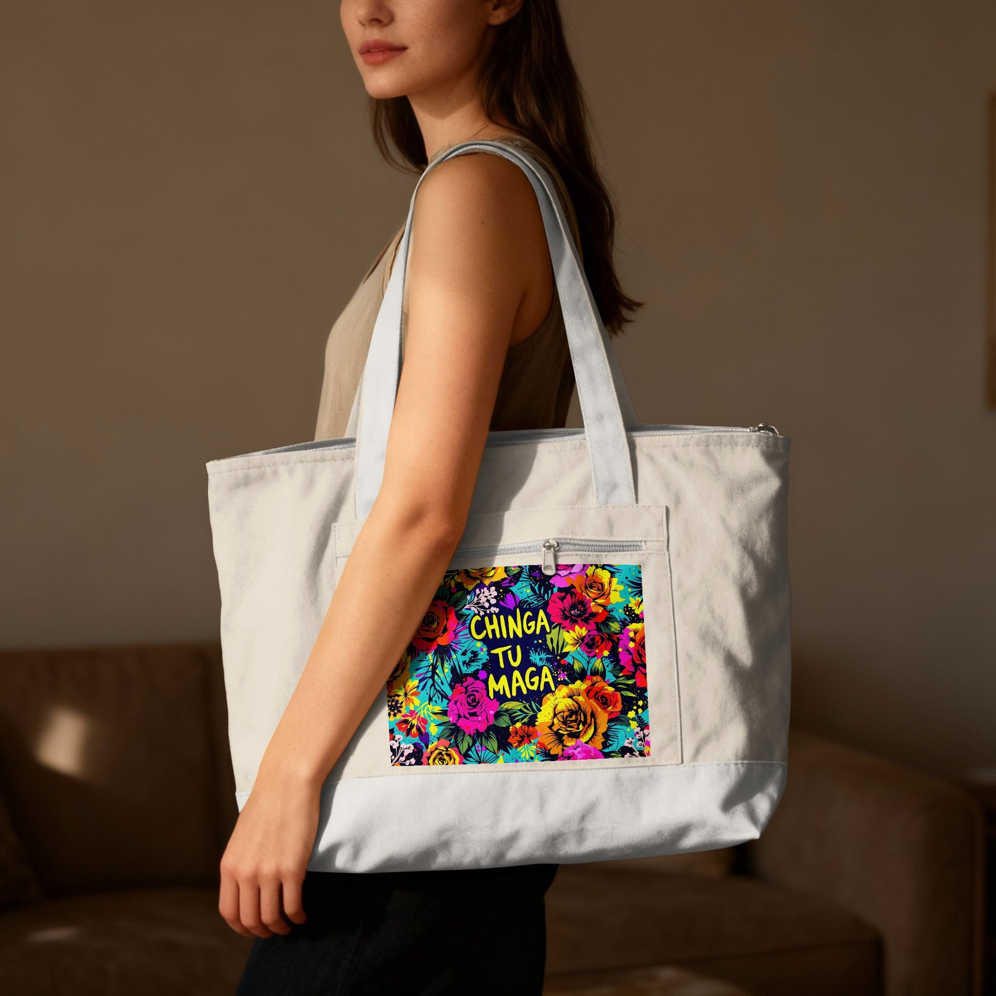 Woman wearing a light-colored canvas tote bag with a vibrant floral pattern.