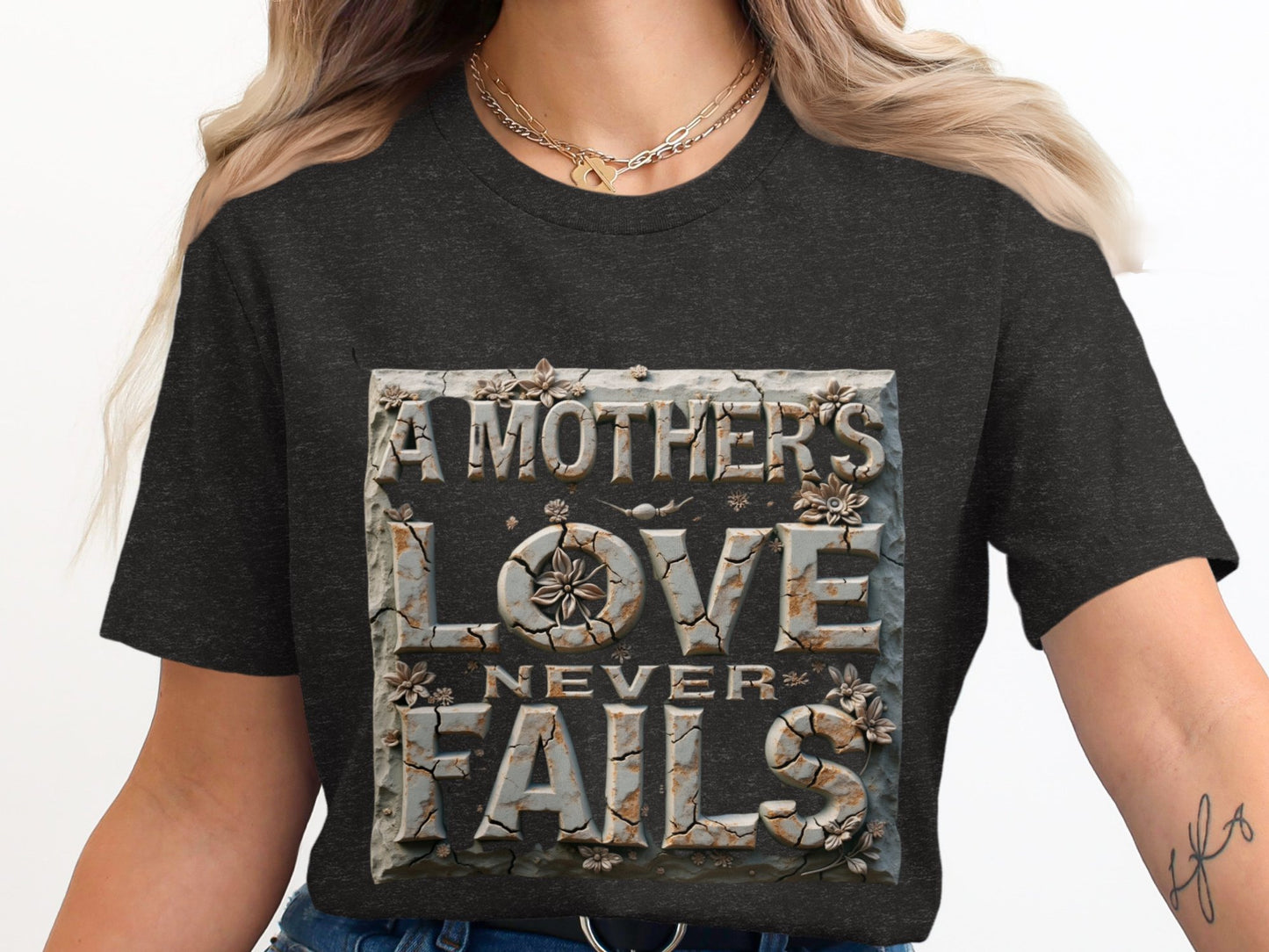 A Mother's Love Never Fails Graphic T-Shirt Product