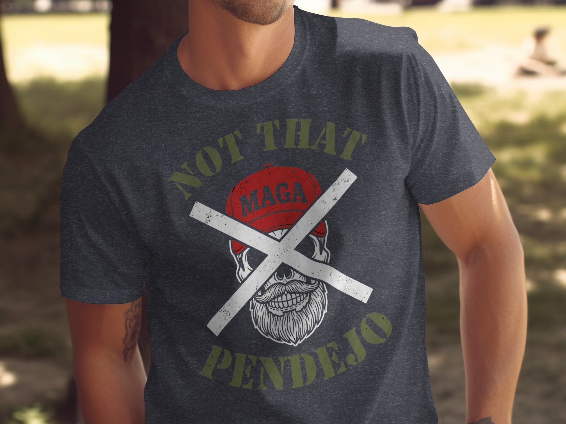 Dark t-shirt with skull wearing a red MAGA hat and crossed bones.