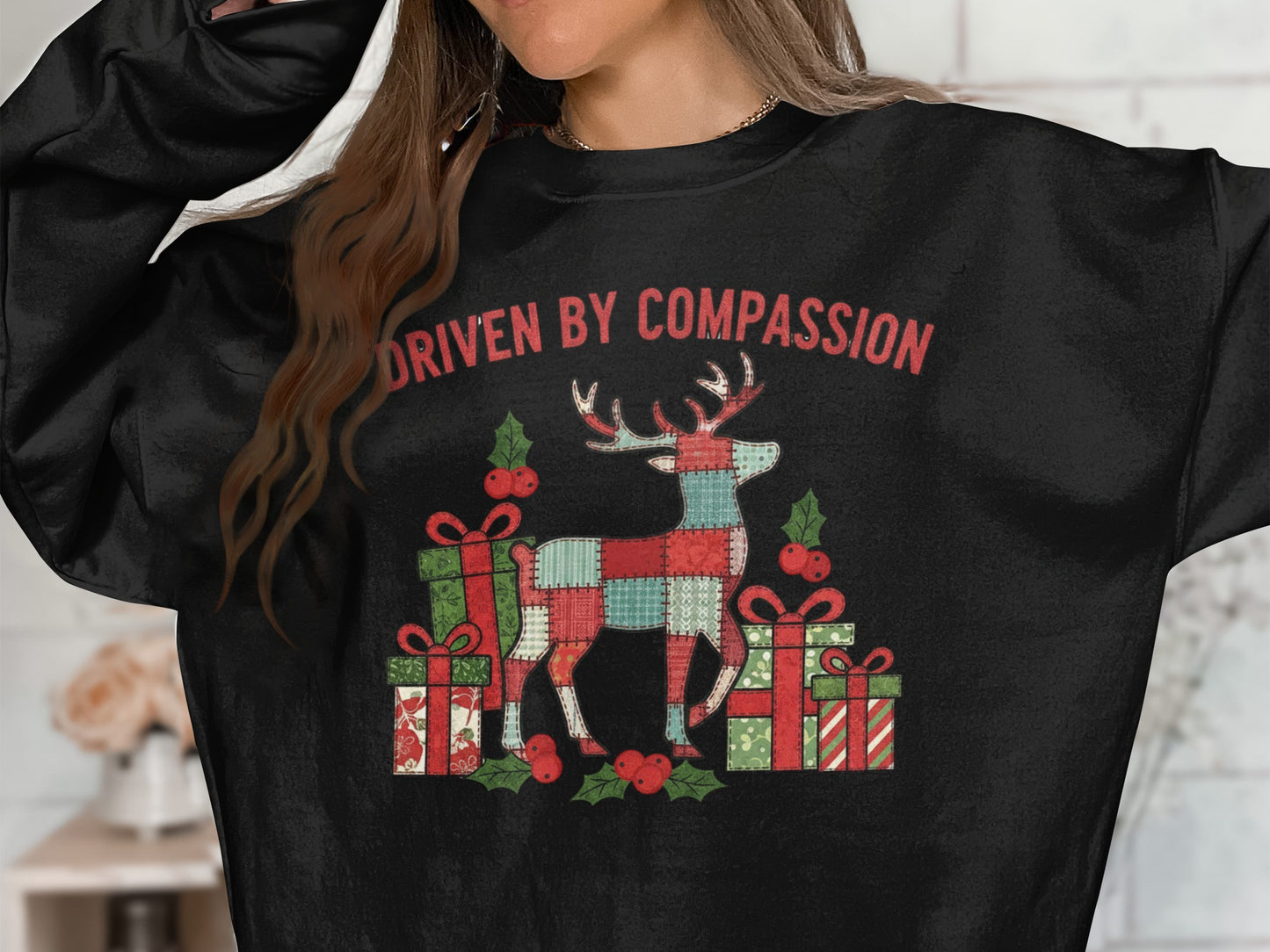 Driven By Compassion Reindeer Sweatshirt