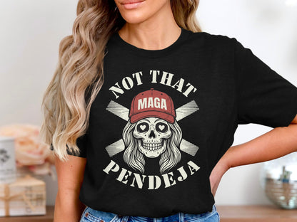 Black t-shirt with skull wearing "MAGA" hat, crossed bones, and text "NOT THAT PENDEJA".