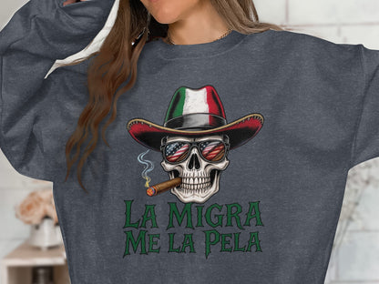 La Migra Me La Pela Skull Wearing Hat Sweatshirt Product
