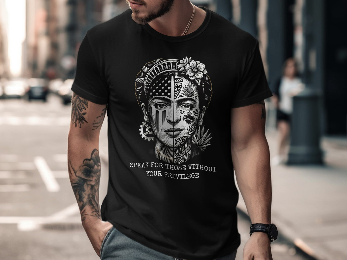 Black t-shirt with a split portrait of Frida Kahlo, half American flag, half floral.
