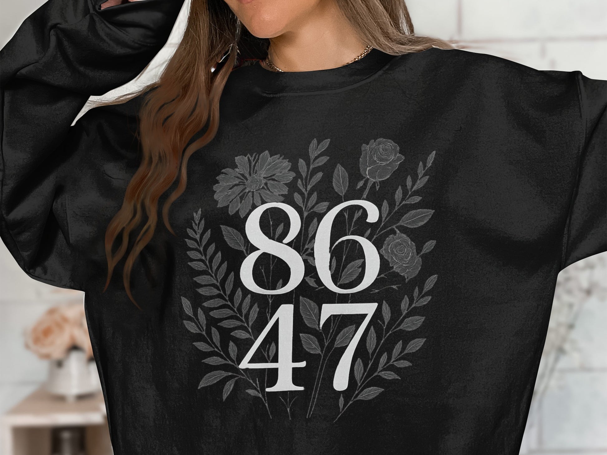 Oversized Black Crewneck with Floral Design product type