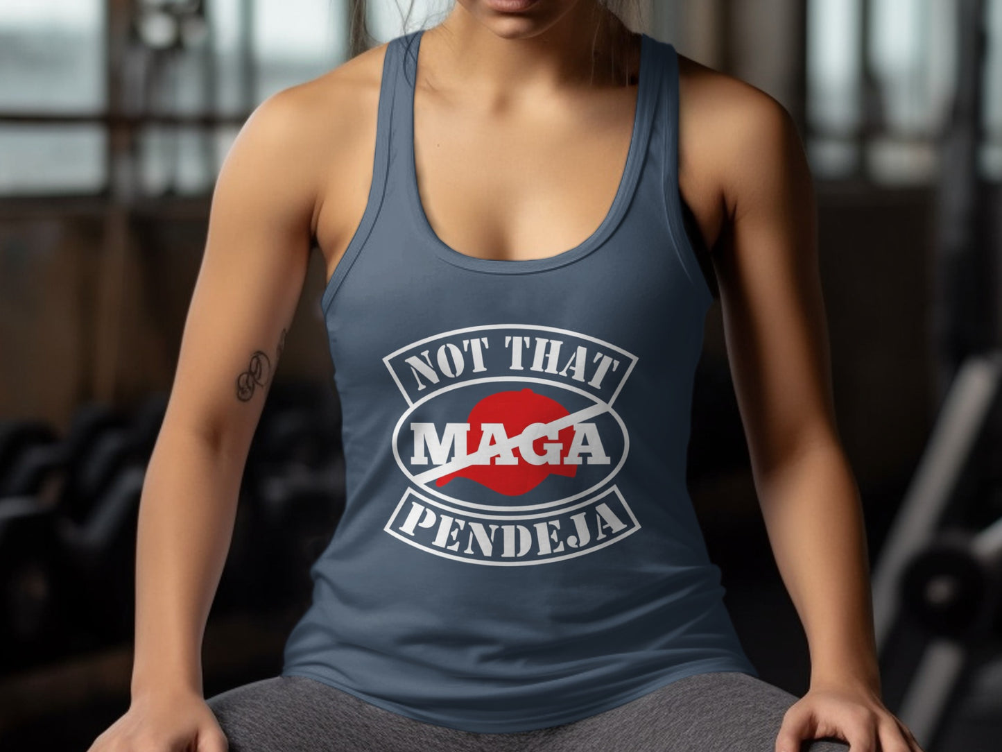 Woman in a blue tank top with "NOT THAT MAGA PENDEJA" slogan.
