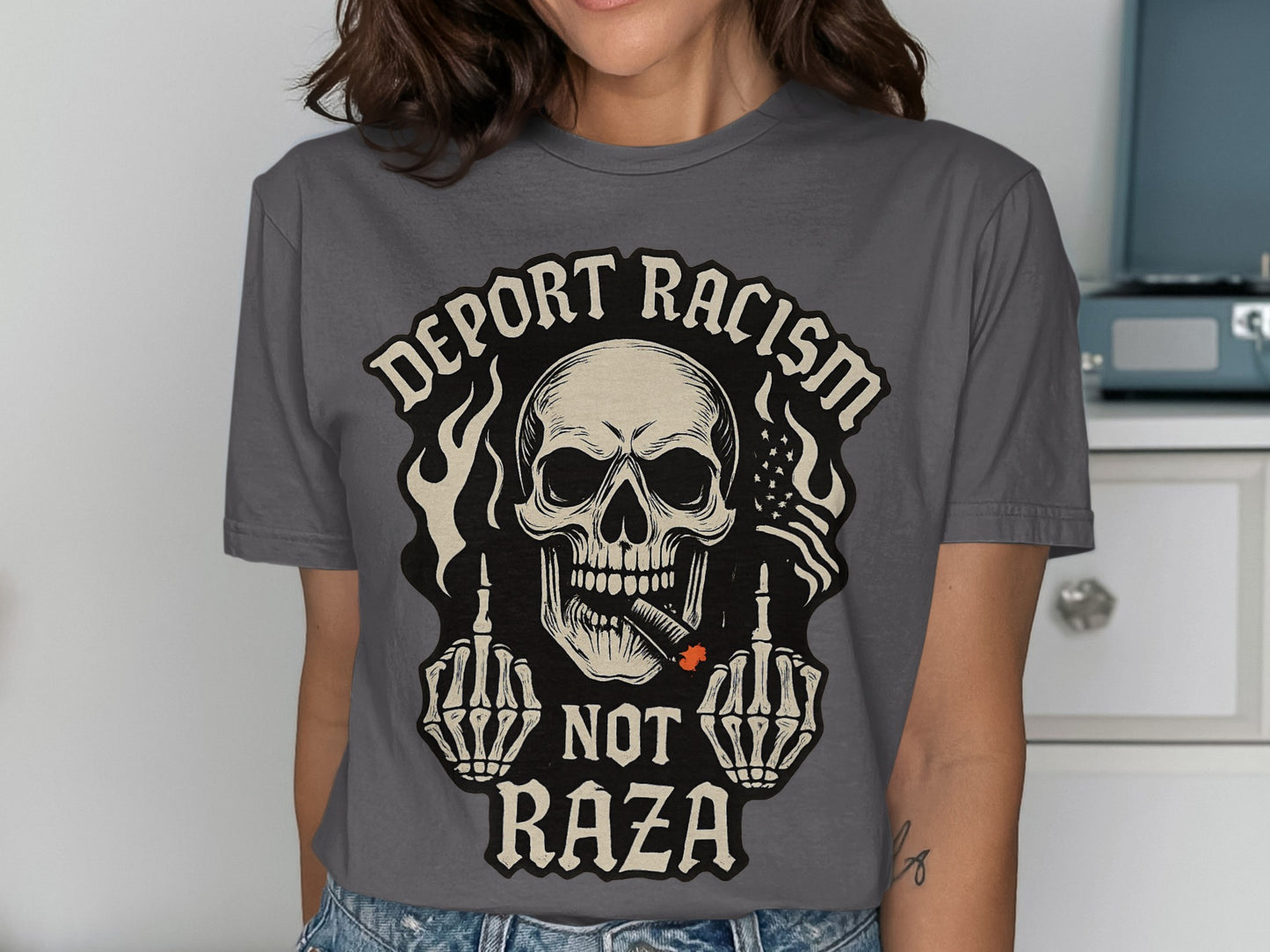 Deport Racism Not Raza Skull Graphic Tee product