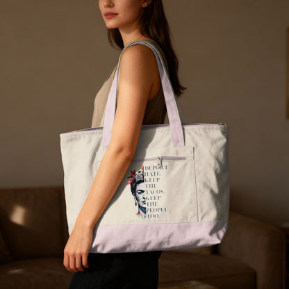 Tote bag featuring Frida Kahlo graphic with text "DEPORT HATE KEEP THE TACOS THE PEOPLE TOO."