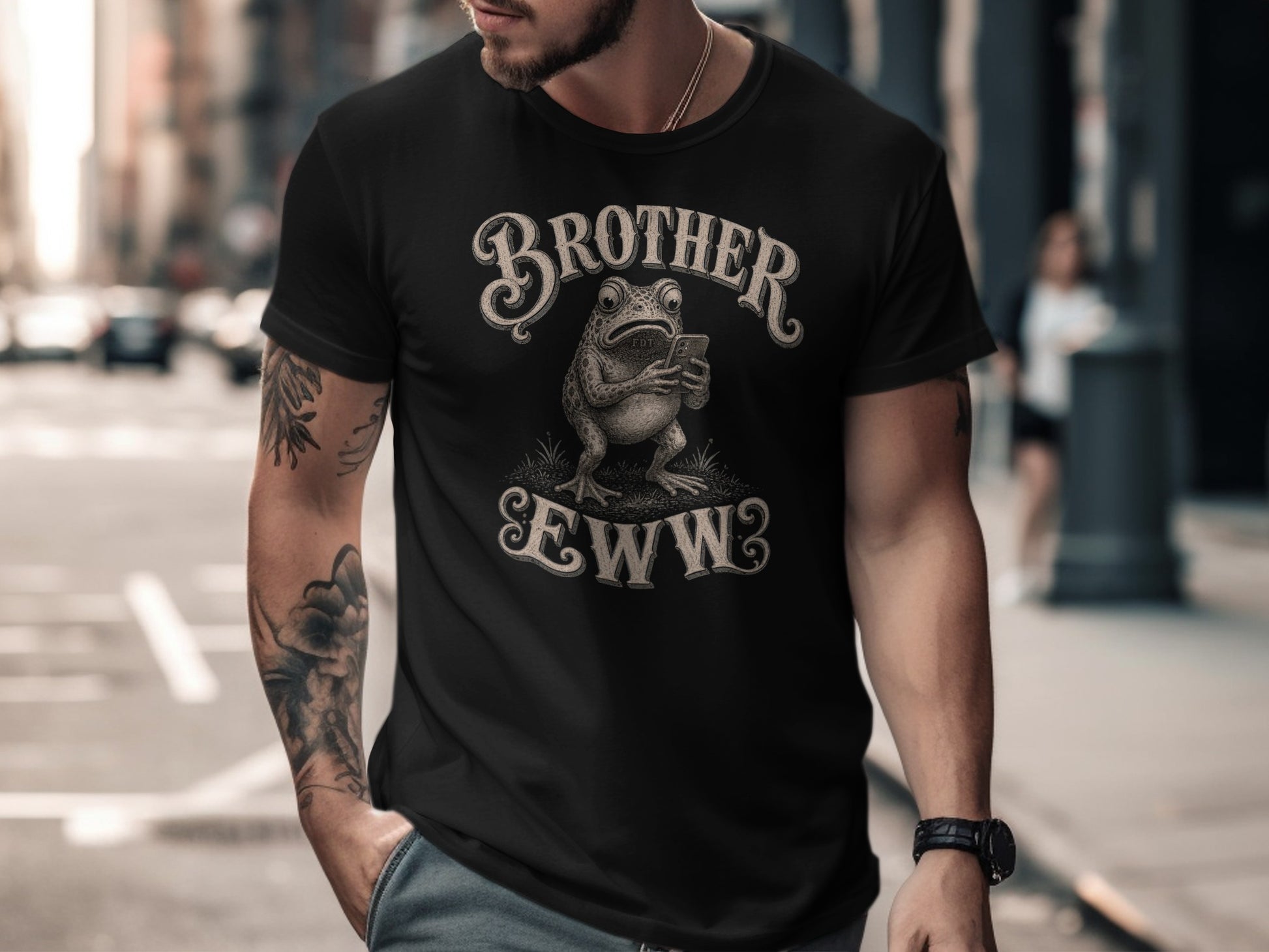 Black t-shirt with "BROTHER EWW" text and a frog holding a phone.