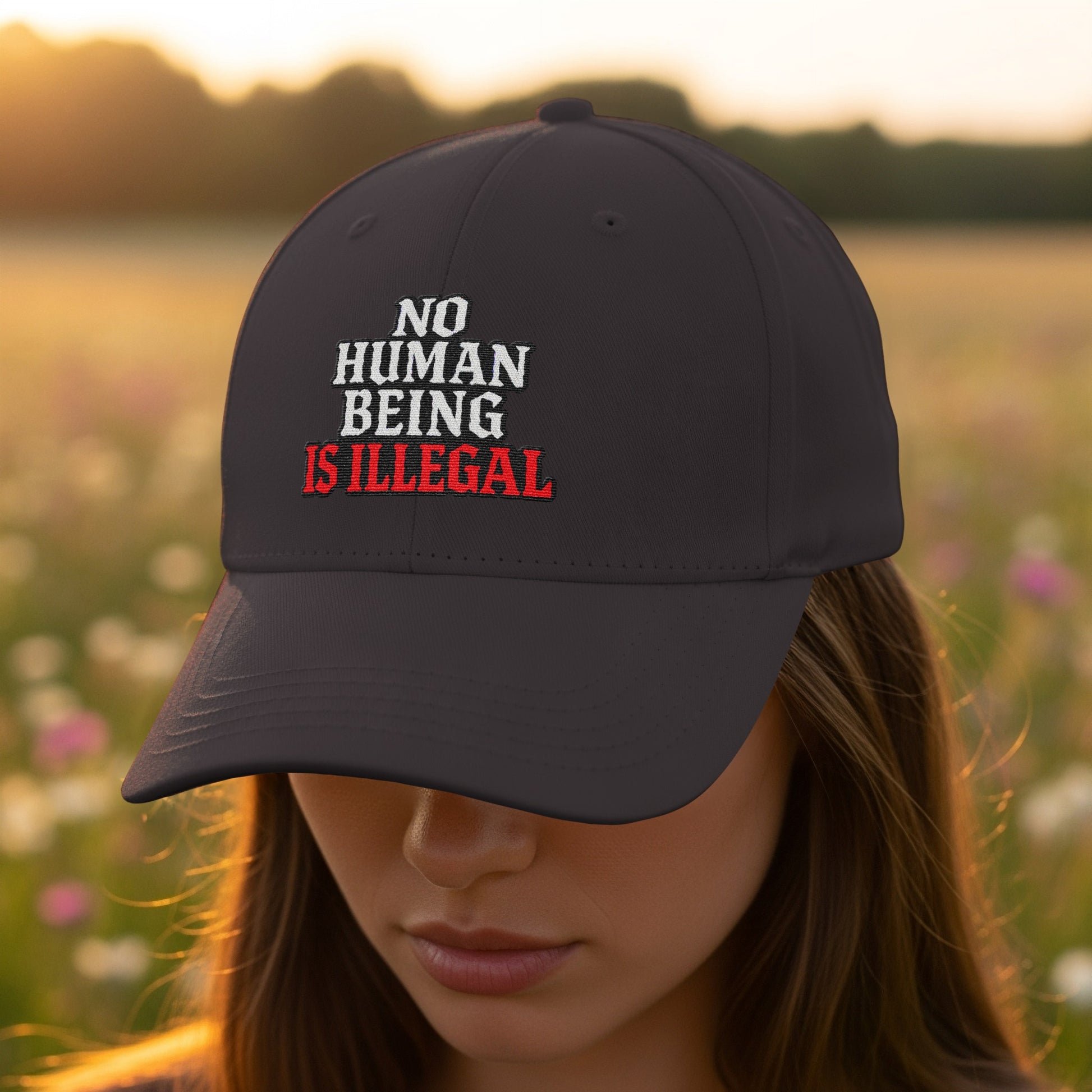 No Human Being Is Illegal Statement Cap product