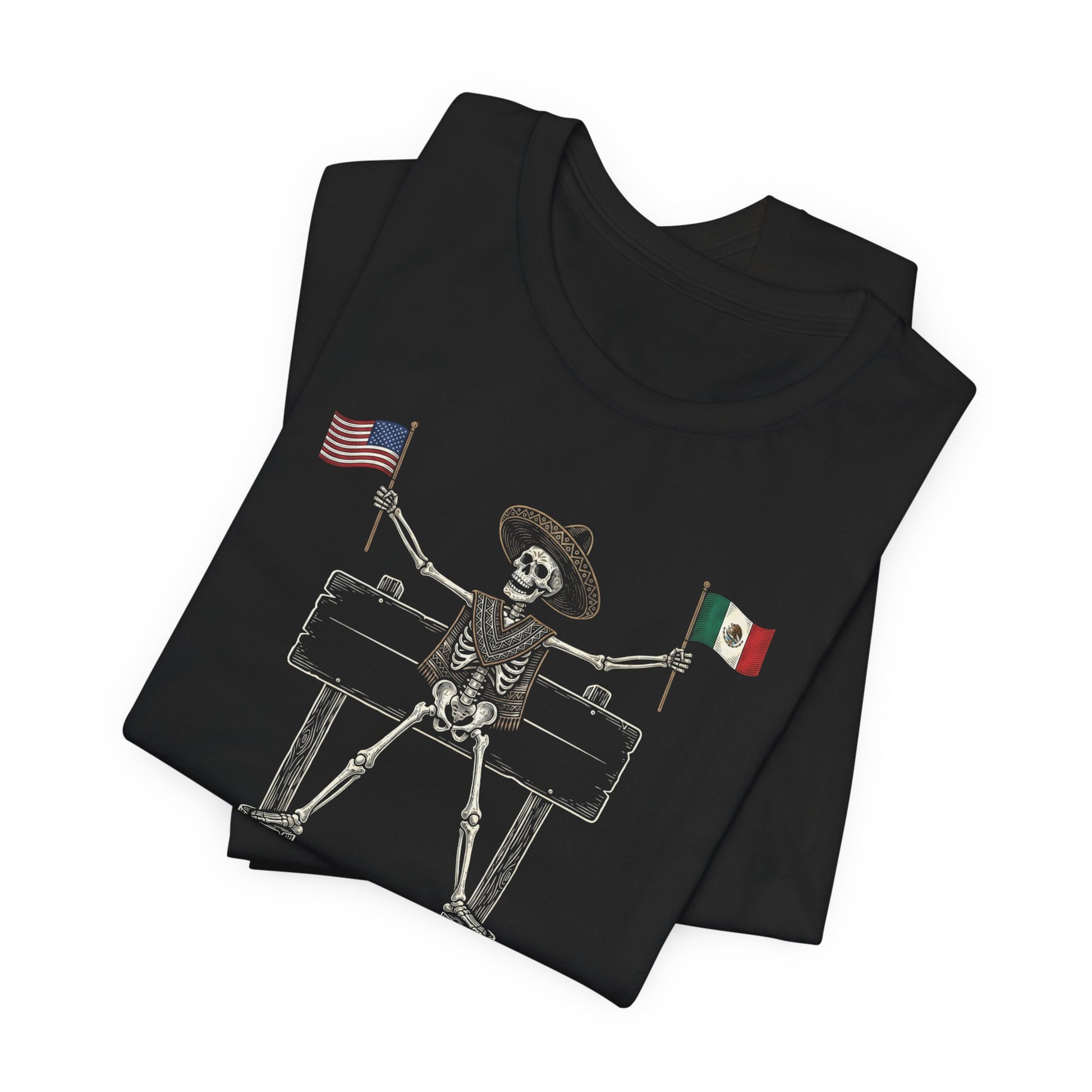 Skeleton in sombrero holding US and Mexico flags on a wooden sign.
