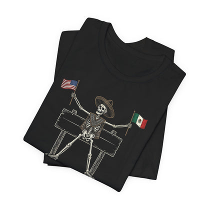 Skeleton in sombrero holding US and Mexico flags on a wooden sign.