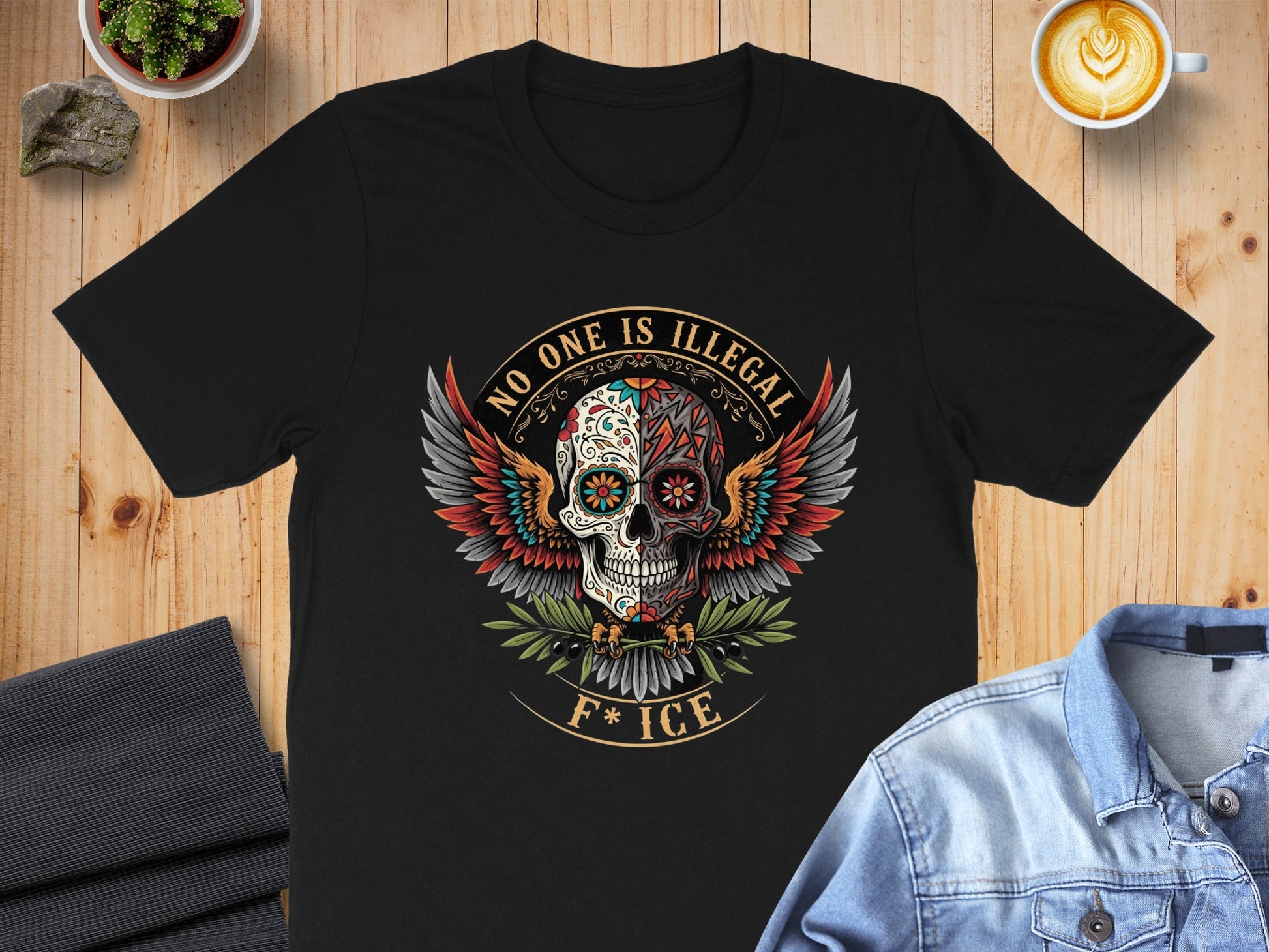 No One Is Illegal Winged Skull Graphic T-shirt product type
