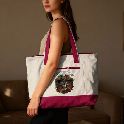 Tote bag with skull, roses, and text "Fight for those without a voice".