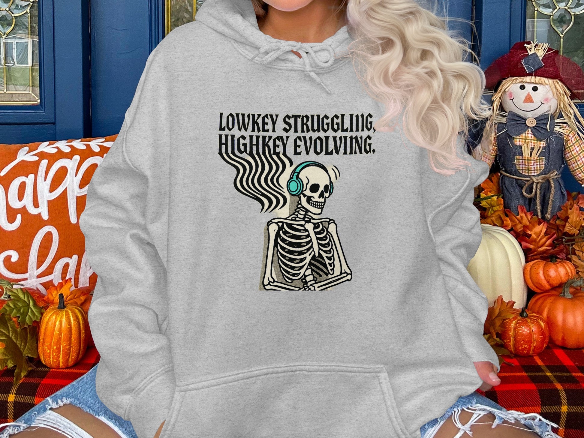 Lowkey Struggling Highkey Evolving Skeleton Hoodie Product