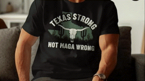 A person wearing a black t-shirt with a graphic design that says "Texas Strong NOT MAGA WRONG".