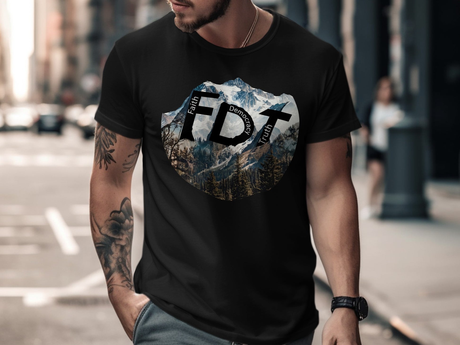 Black t-shirt with "FDT" and "Faith Democracy Truth" text on mountain graphic.