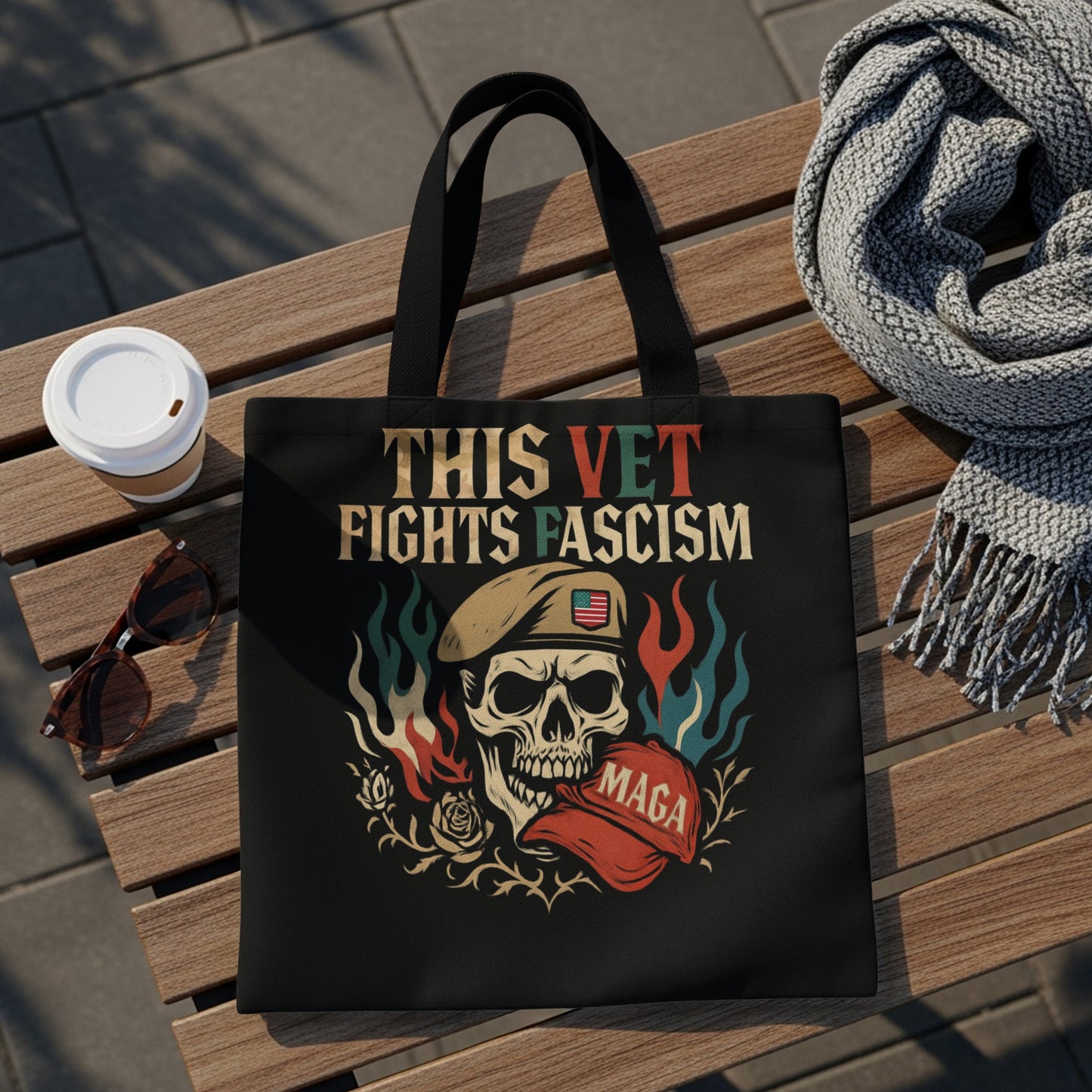 Tote bag with skull, flag, and text "This Vet Fights Fascism MAGA".