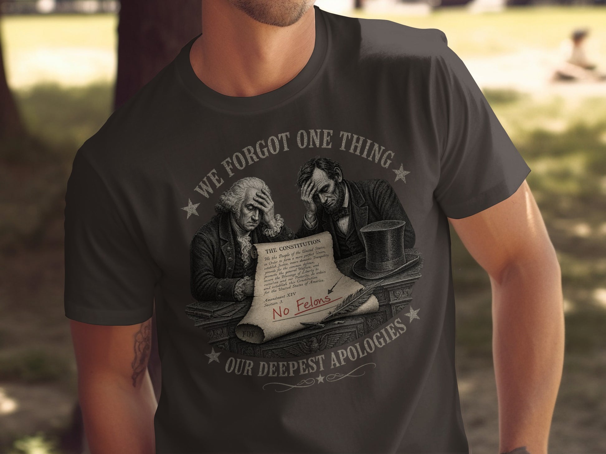 T-shirt with Constitution text, "We Forgot One Thing," and "No Felons."