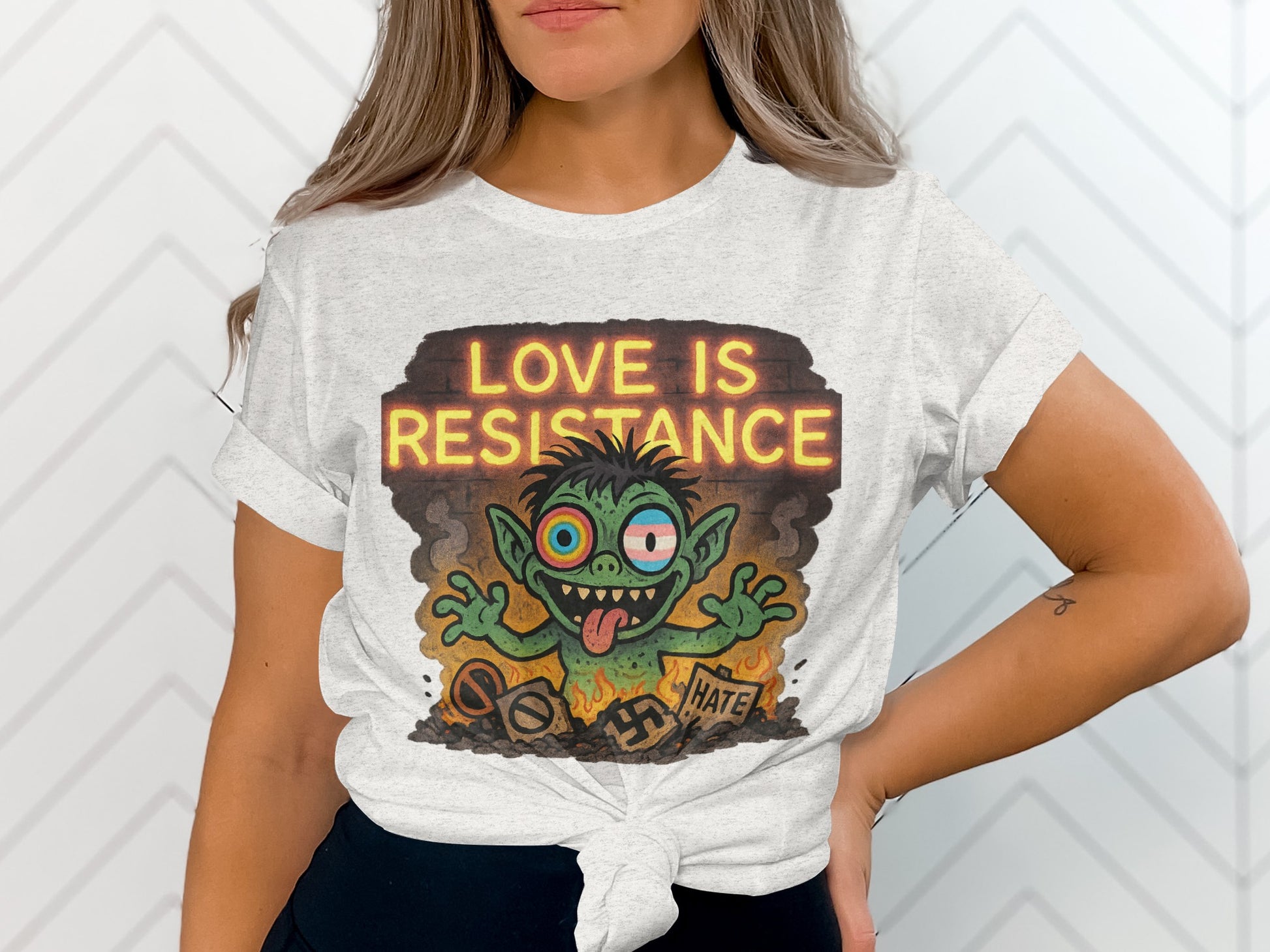 Love Is Resistance Graphic Teeshirt with Monster Design