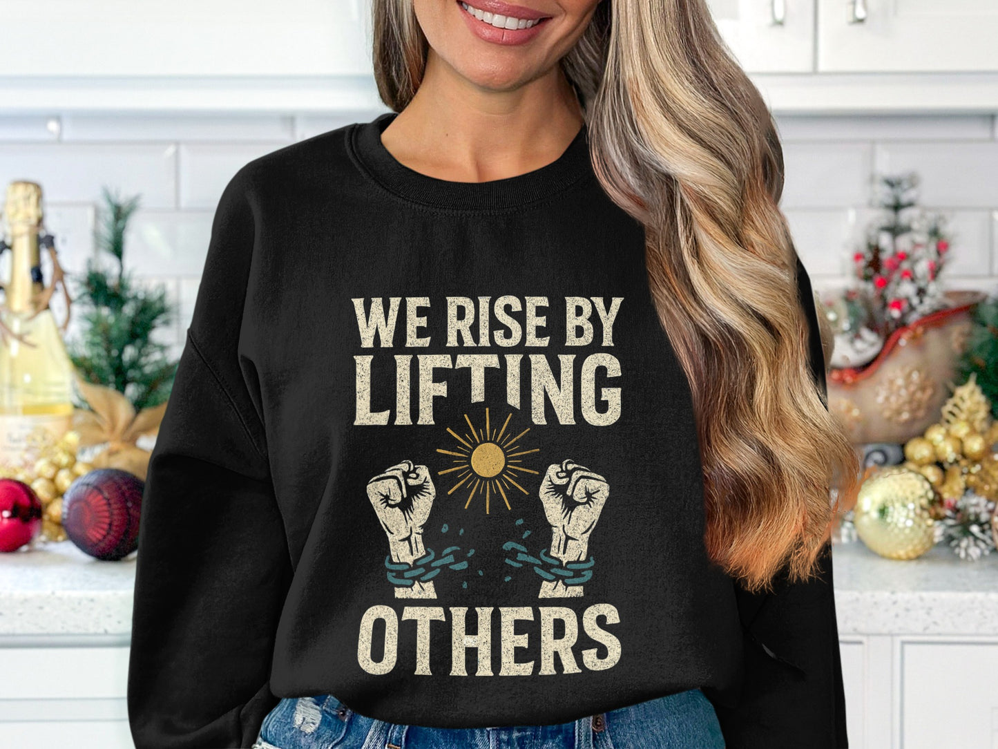 We Rise By Lifting Others Graphic Sweatshirt product