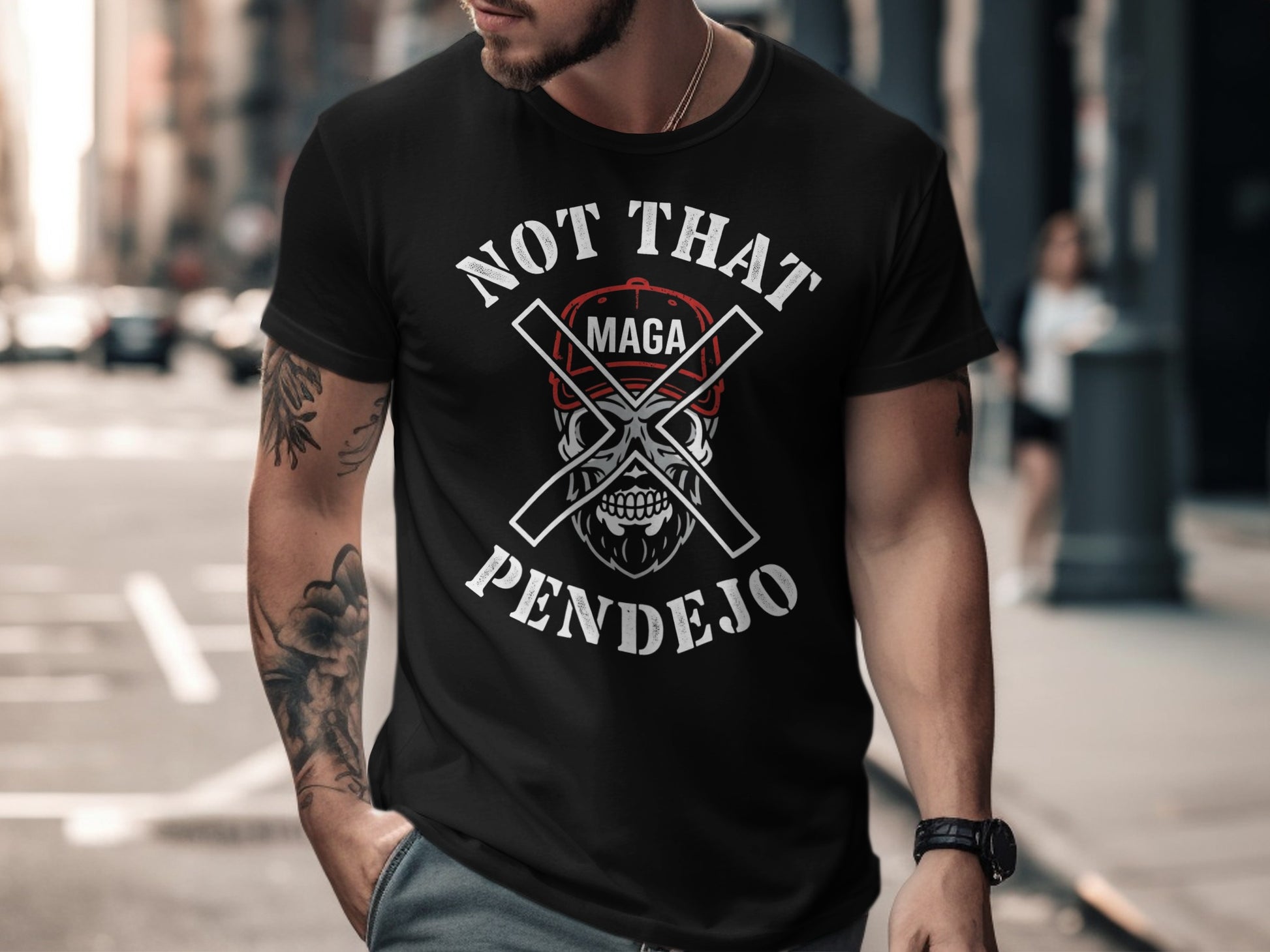 Black t-shirt with "NOT THAT Pendejo" and crossed axes graphic.