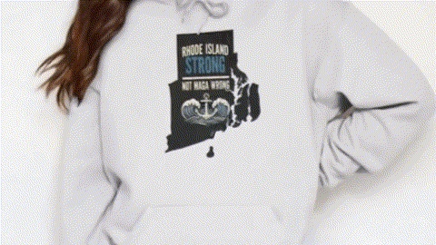 A person wearing a white hoodie with a graphic design on the front.
