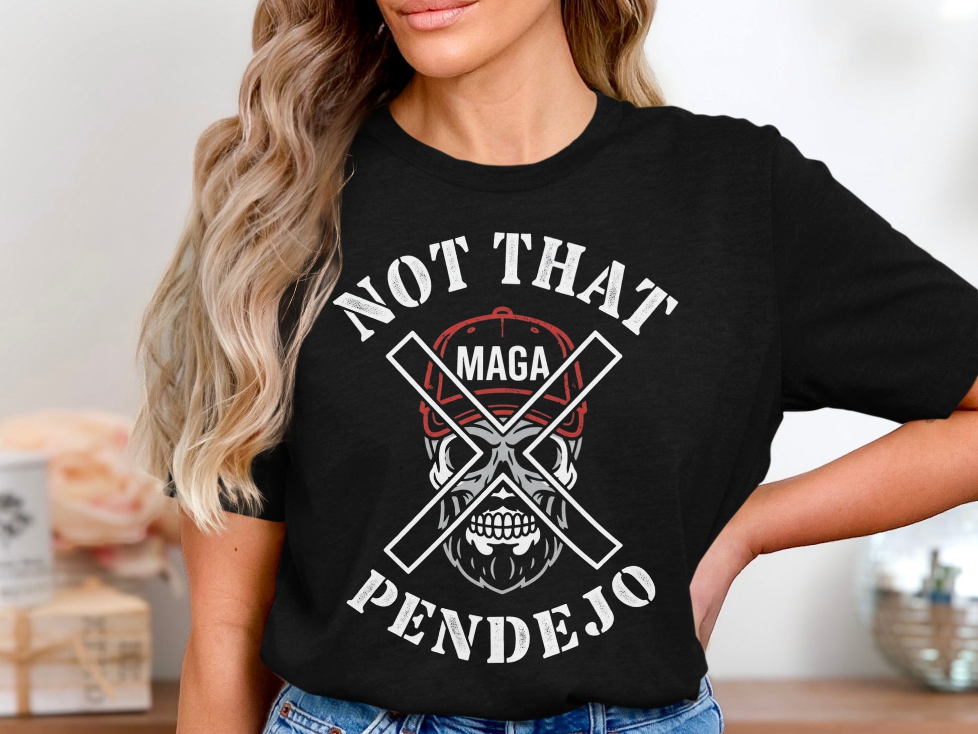 Black t-shirt with skull, crossed flags, and text "NOT THAT PENDEJO".