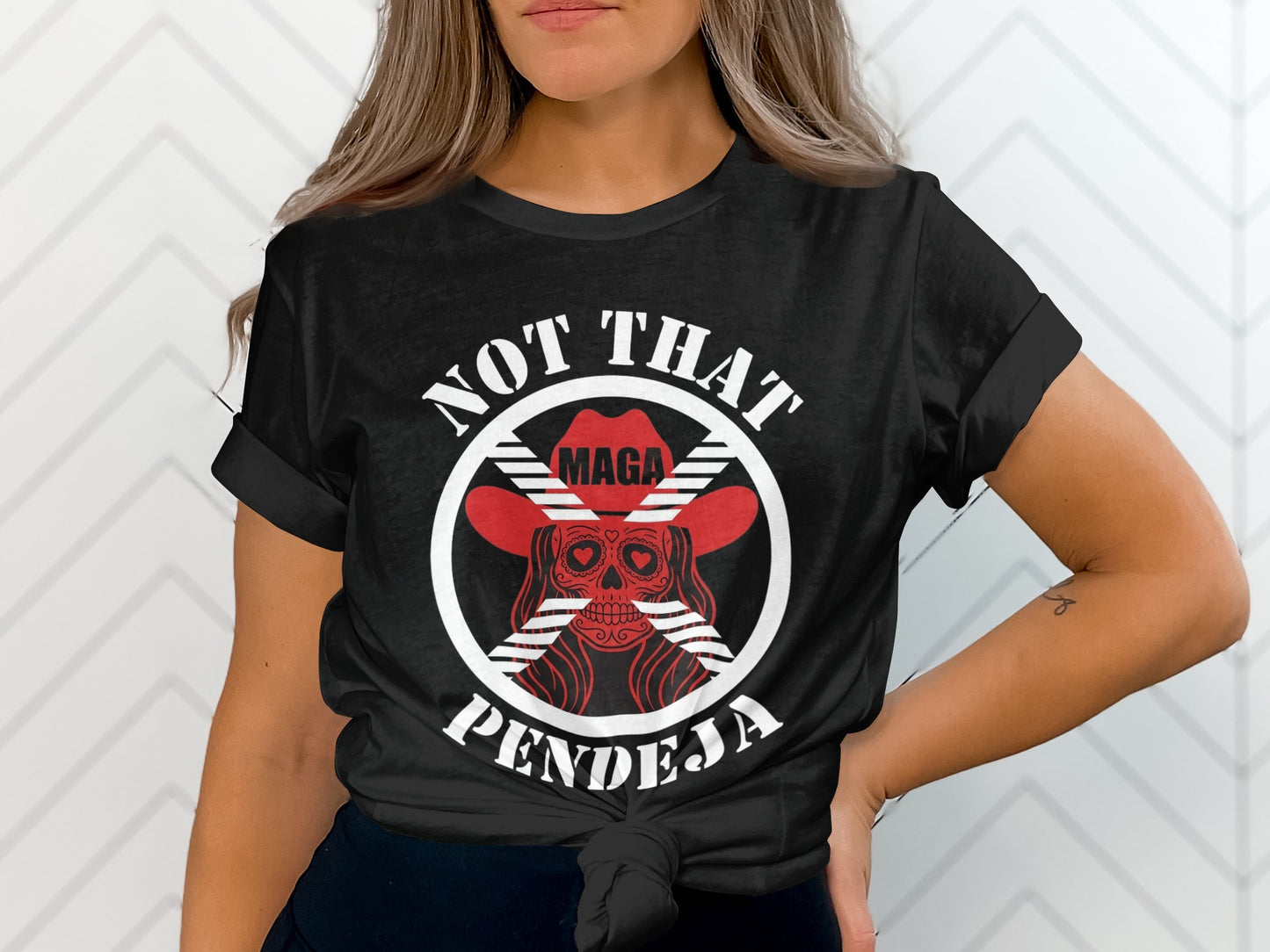 Black t-shirt with red "NOT THAT MAGA PENDEJA" text and skull design.