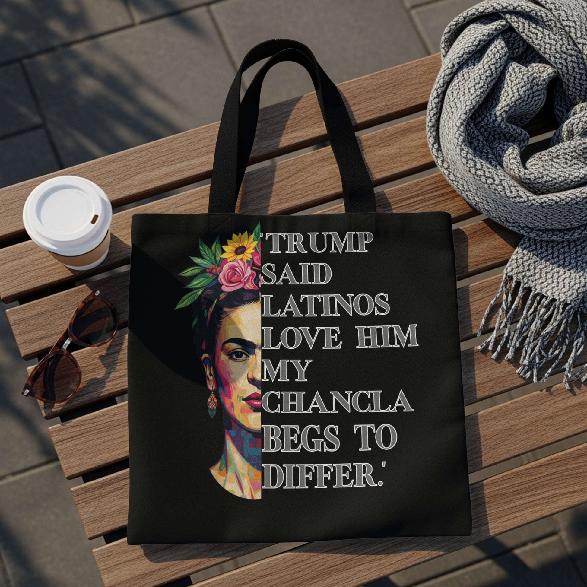 Tote bag featuring Frida Kahlo's portrait with text "Trump said Latinos love him my chancla begs to differ."