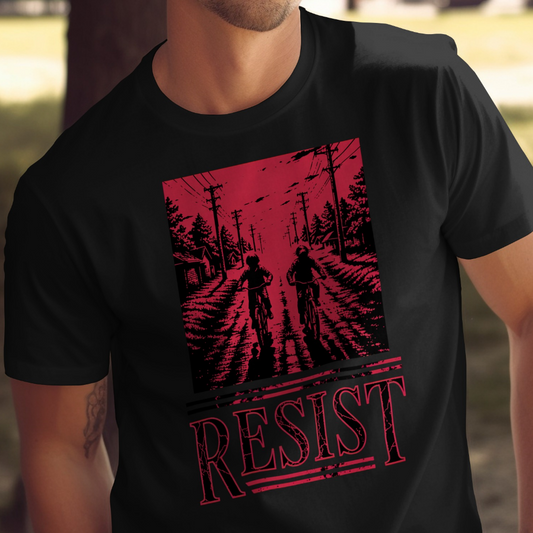 Black t-shirt with a graphic of two figures on bikes and the word RESIST.