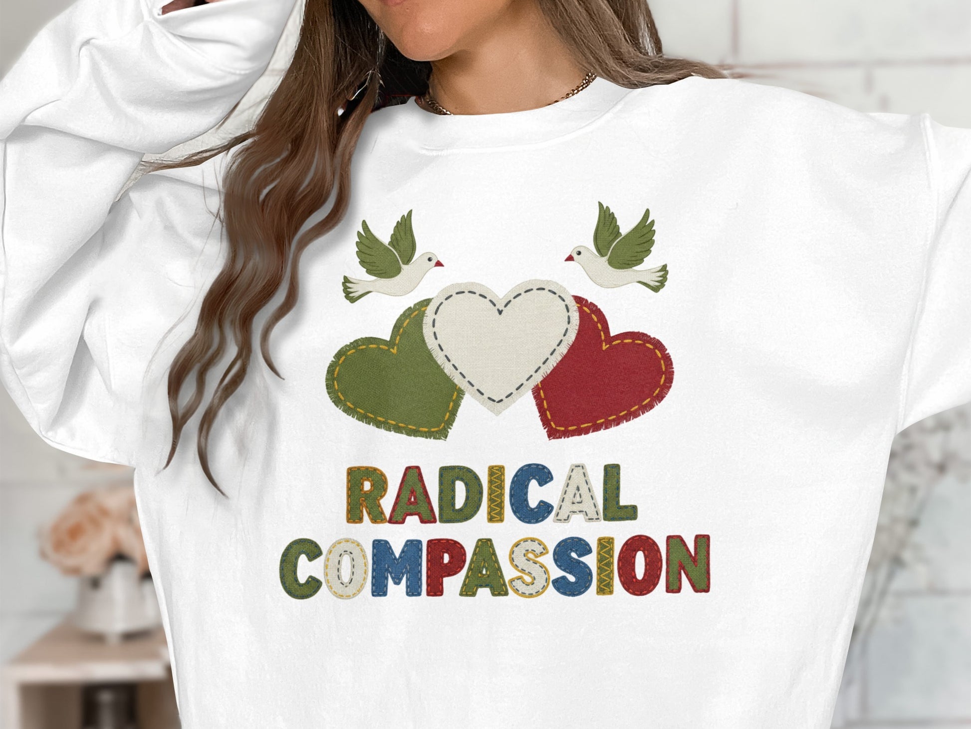 Radical Compassion Graphic Sweatshirt Product