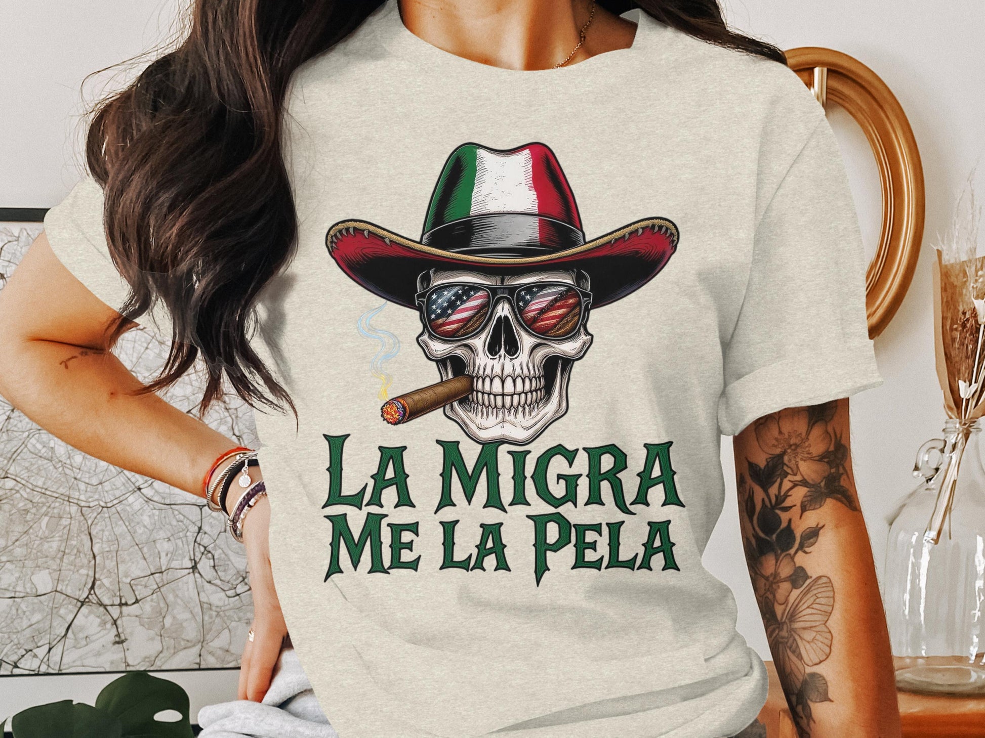 La Migra Me La Pela Skull with Hat Graphic Tee product