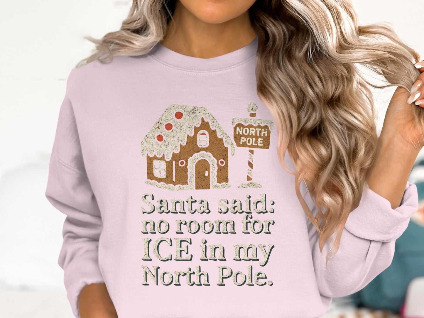 Santa said no room for ICE in my North Pole sweatshirt