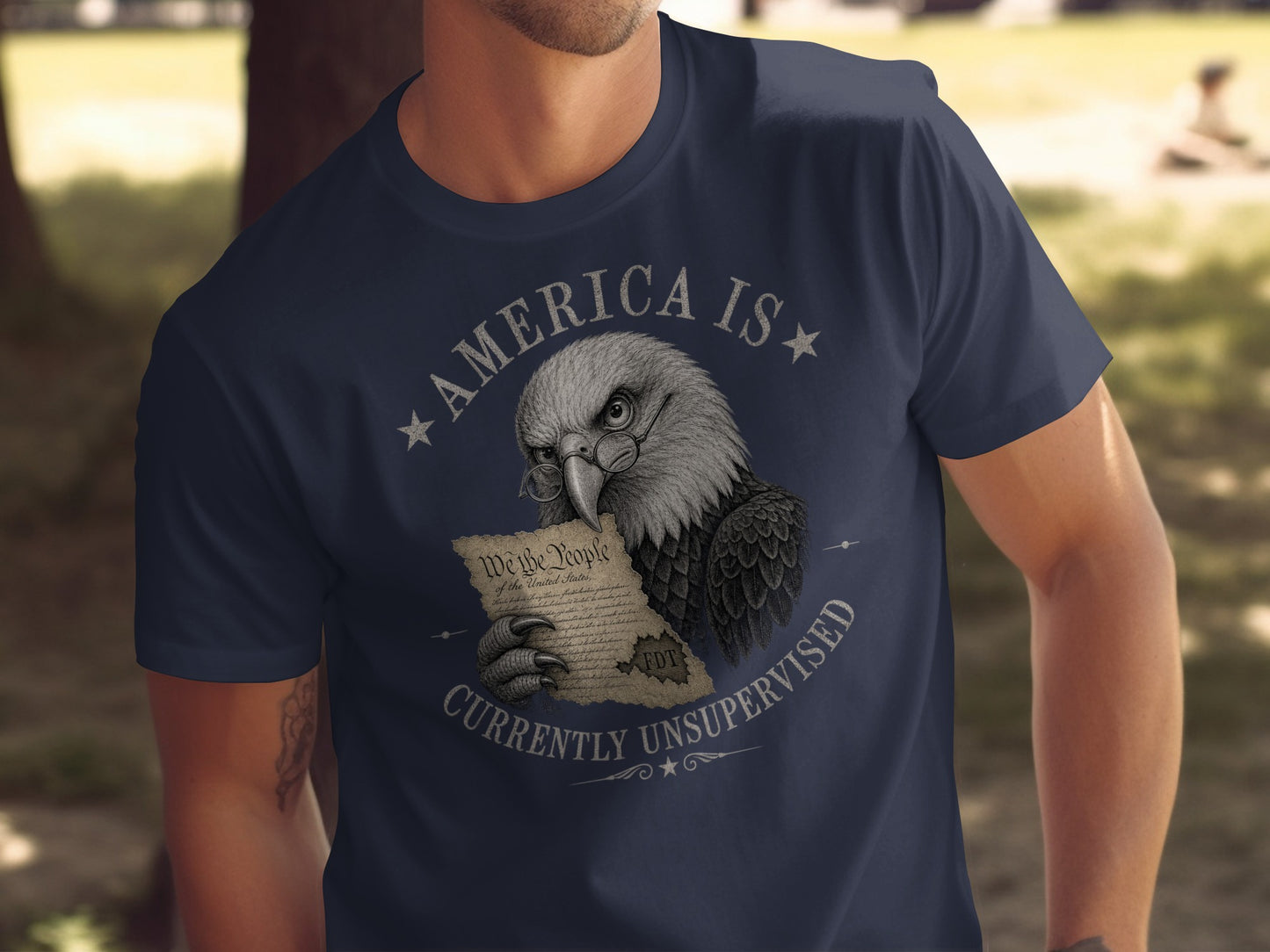 Eagle wearing glasses holding a document titled "We the People" with text "AMERICA IS CURRENTLY UNSUPERVISED".